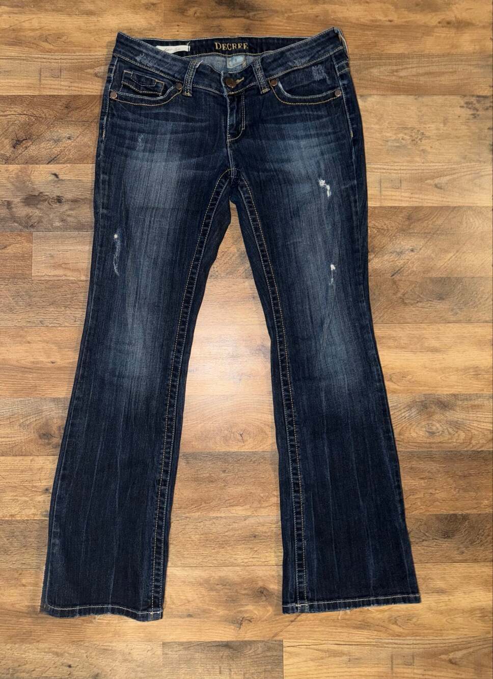 Decree women’s distressed bootcut blue jeans